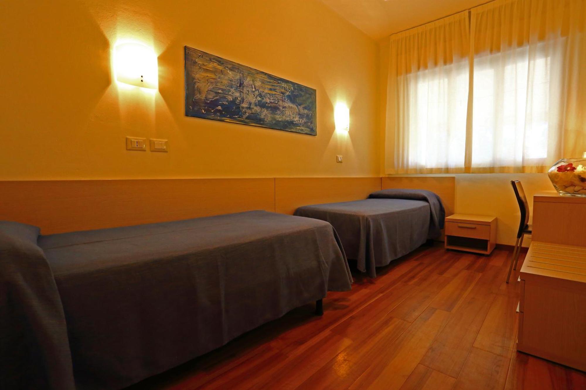 Hotel Castiglione Lignano Sabbiadoro Værelse billede